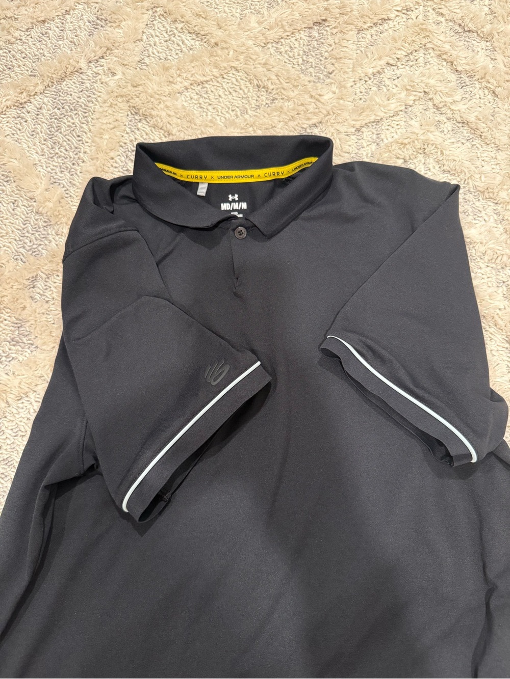 Under Armour Curry Men’s Black Polo with White Trim